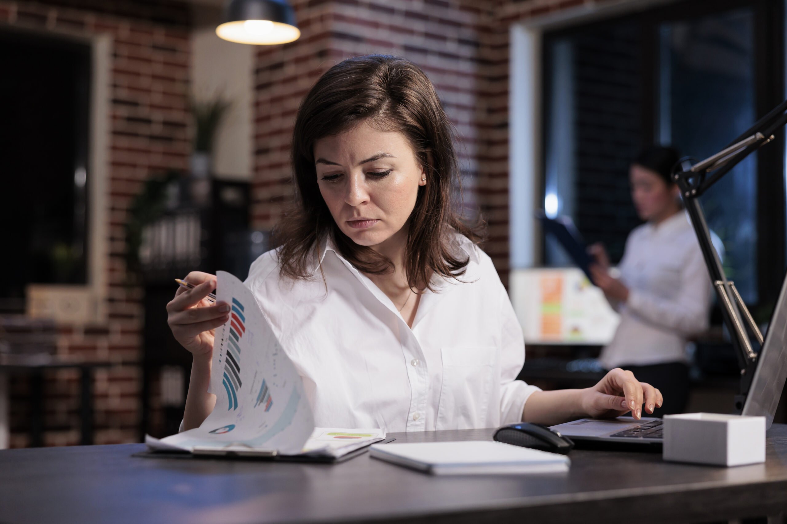 A restaurant manager reviewing competitor pricing and discount strategies to optimize menu profitability.
